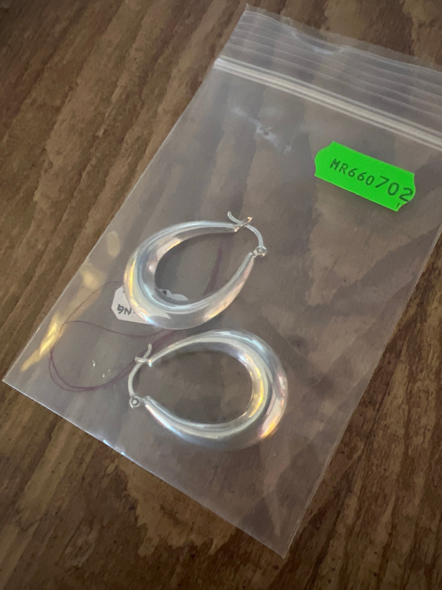 Sterling silver oval hoop earrings