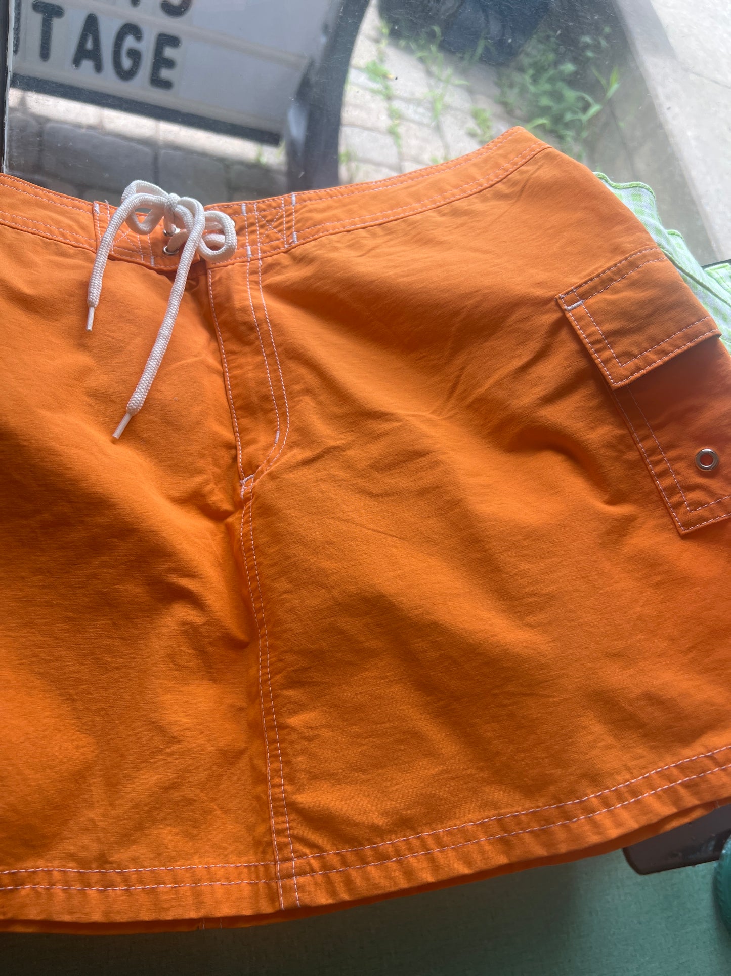 Orange cargo mini skirt